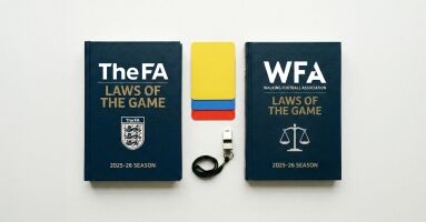 Walking football rule books and cards displayed.